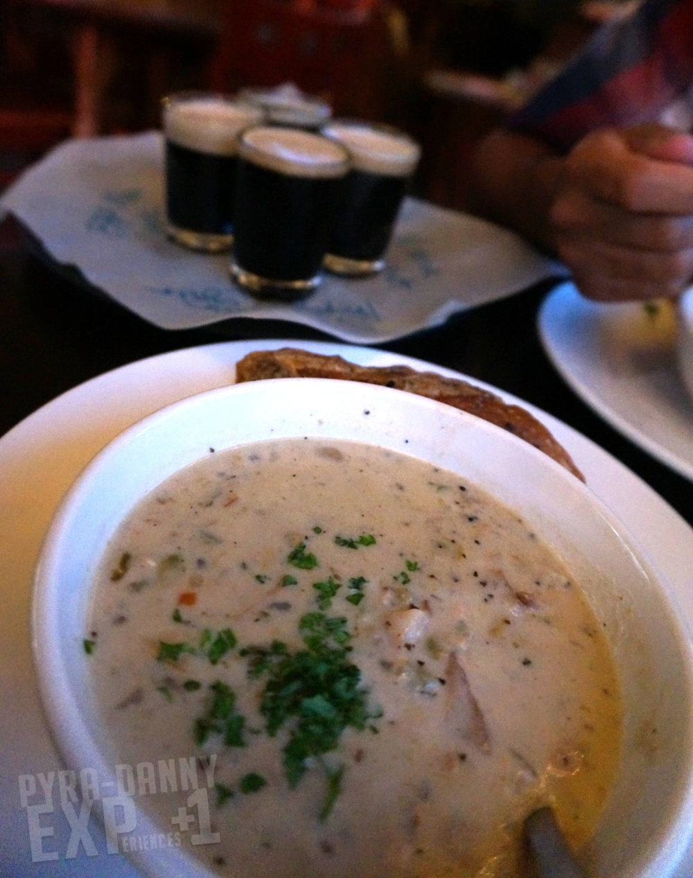 Clam Chowder in front of a beer flight from Oyster House Brewing [Eating Up the Asheville Scene | PyraDannyExperiences.com]